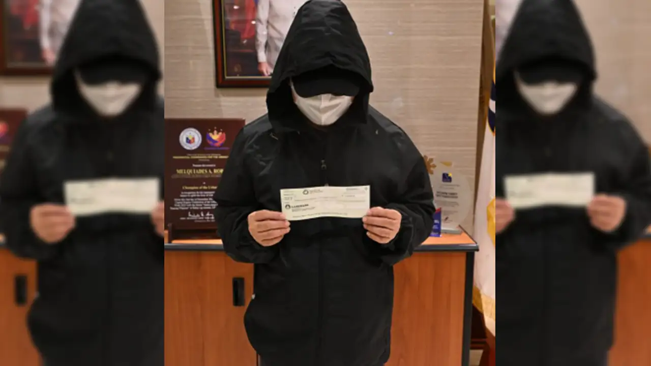 LOTTO 6/42 WINNER FROM QUEZON CITY CLAIMS P5.9-M JACKPOT; VOWS TO PAY IT FORWARD